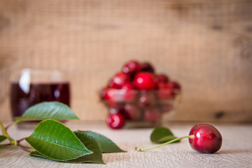 cherries and cherry juice on the table