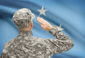 Soldier in hat facing national flag series - Micronesia