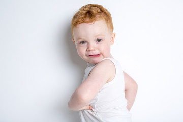 Naklejka premium baby boy portrait over a isolated white background