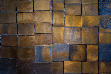 golden rectangular shape tile wall background