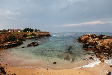 View from the wall to the sandy cove at Fort Galle