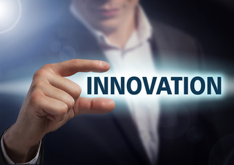 Businessman presses button innovation on virtual screens. Busine