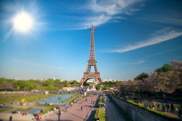 Fototapeta na wymiar summer day the sun shines over the Eiffel Tower symbol of Paris.