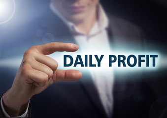 Businessman presses button daily profit on virtual screens. Busi