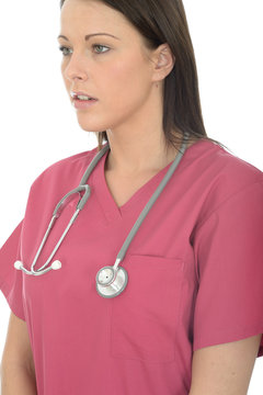 Portrait Of A Young Beautiful Female Doctor Wearing Pink Theatre Scrubs