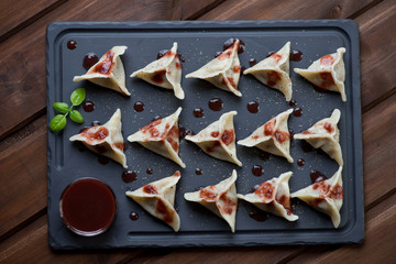 Khinkali or a type of eastern meat dumplings, above view