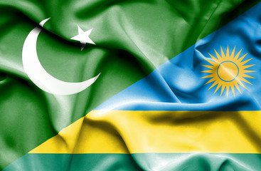 Waving flag of Rwanda and Pakistan