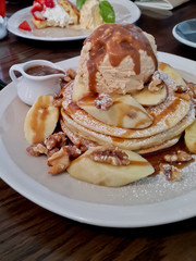 Banana Pancakes. Butterscotch, House made peanut butter ice cream