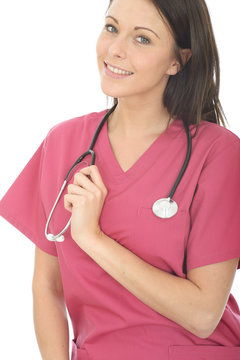 Beautiful Happy Smiling Young Female Doctor Wearing Pink Theatre Scrubs