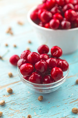 Sweet Cherry in Bowl on Rustic Table