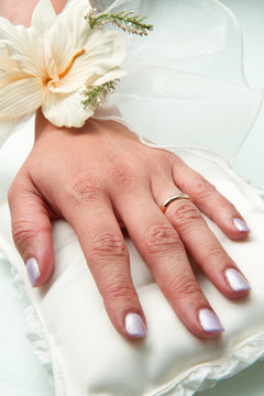 bridal hands with wedding ring