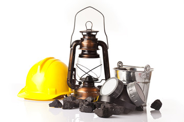 Mining tools with with ear muffs and oil lantern