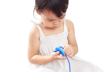 Asian Baby Girl Playing Threading Buttons Line Toy Isolated on White Background.