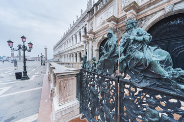 Fototapeta premium Decorative metal gate ornament. Antique iron door with classic ornaments of Campanile in Doge's palace, Venice, Italy 