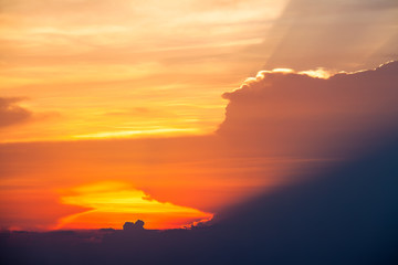 Sunset with sun rays in the sky.