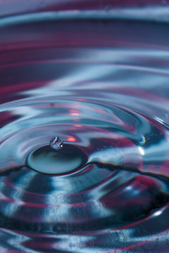 Blue and magenta water drop