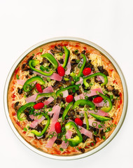 Fresh pizza before placing in the oven.