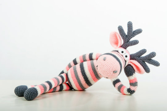 Soft toy lying elk