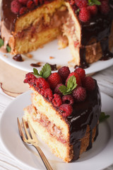 sliced raspberry cake with fresh berries close up vertical
