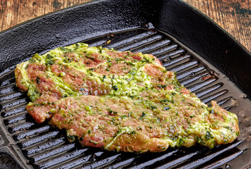 raw marinated pork steak