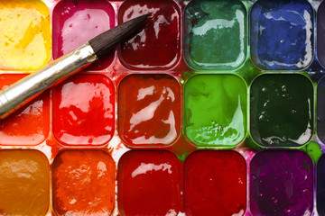 old watercolor paints and brushes