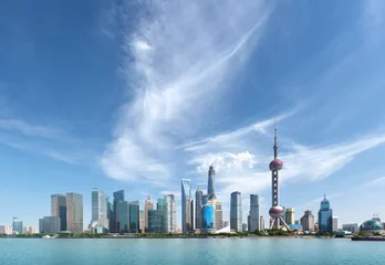 Foto auf Acrylglas Skyline von Shanghai am sonnigen Tag, China © Iakov Kalinin