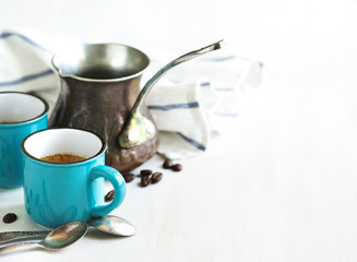 Obraz na płótnie Canvas Cups of coffee and coffee pot.