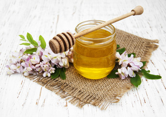 Obraz na płótnie Canvas honey with acacia blossoms