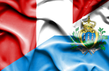 Waving flag of San Marino and Peru