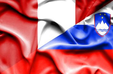 Waving flag of Slovenia and Peru