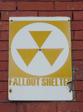 Old Fallout Shelter Sign on Brick Wall
