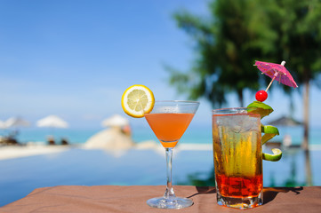 Summer drinks with blur beach