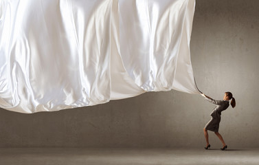 Woman pull curtain