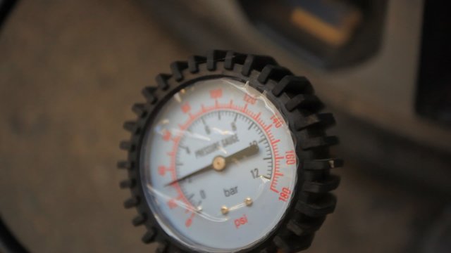 Car wheel add air pressure. Pump pumps