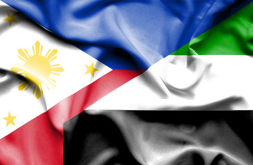 Waving flag of United Arab Emirates and Philippines