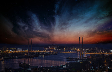 Naklejka na ściany i meble City landscape at night with sky with stars and nebula.