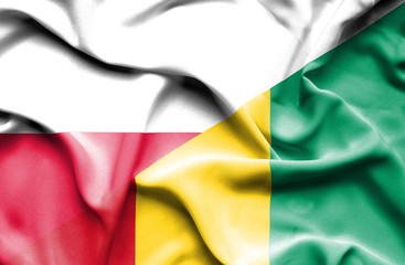 Waving flag of Guinea and Poland