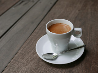 cup of coffee latte on the wood texture