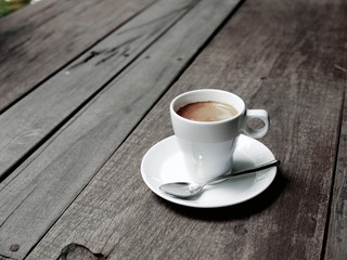 cup of coffee latte on the wood texture