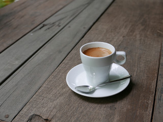 cup of coffee latte on the wood texture