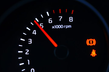 car dashboard speedometer tachometer macro