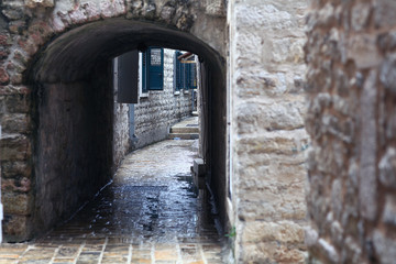 paved street stone walls Europe