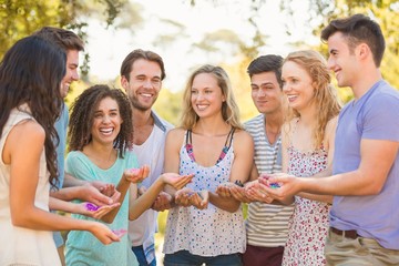 Friends having fun with powder paint