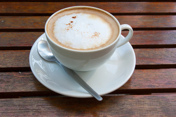 Coffee cup on wooden table