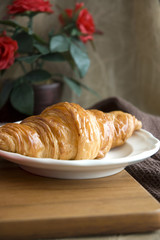 golden croissant on dish