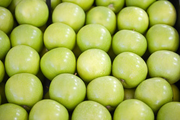 neatly folded green apples