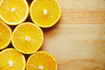 Fototapeta na wymiar Halves of oranges background