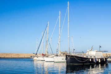 yachts moored in a harbor