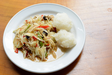 Green papaya salad (Som Tum) with sticky rice