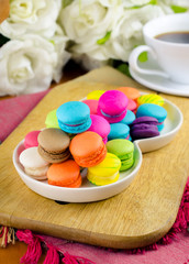 Colorful macarons on white plate/Close up image